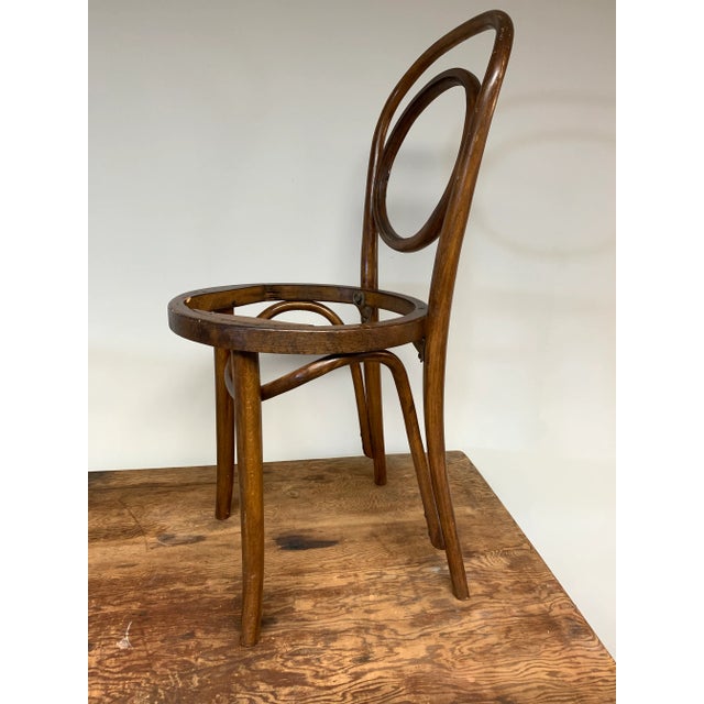 Wonderful antique bentwood chair in excellent structural condition, just needing a fresh seat. I believe this could be...