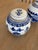 A charming pair of small ginger jars crafted in classic blue and white, featuring delicate Asian-inspired motifs. Their...
