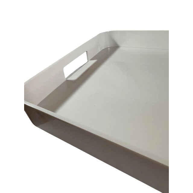 Very sleek and modern white acrylic tray by the brand Zak! Great as a catchy or serving tray