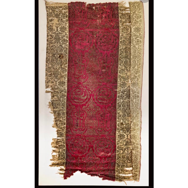 Embroidered velvet panel with mirrored thuluth calligraphic cartouches A rectangular textile woven fragment, comprising...