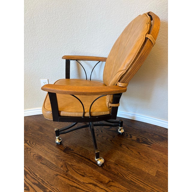 Bring warm vintage character to your office, library, or den with this distinctive 1970s swivel chair by U.S. Furniture...