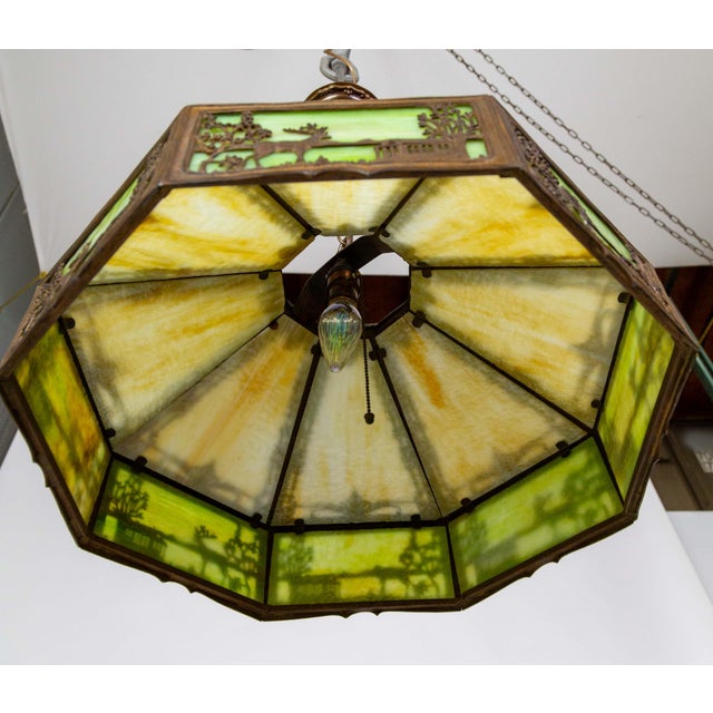 Metal Early 20th Century Pale Green-Amber Slag Glass Pendant Light With Scenic Trim For Sale - Image 7 of 12