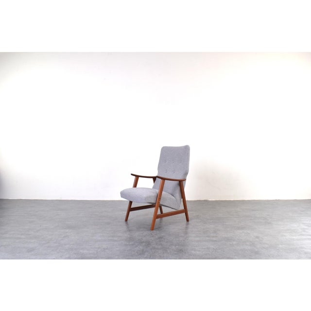 This teak armchair was made in Denmark in the 1960s. The frame of the easy chair is made of solid teak wood and has been...