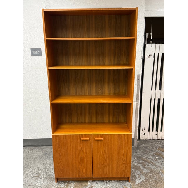 Design Plus Gallery presents the Scandinavian Designs Veneer Bookcase with Lower Cabinet Storage. This veneer bookcase has...