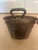 This antique primitive copper basin bucket features a unique dovetail cramp seam design along the bottom, adding to its...