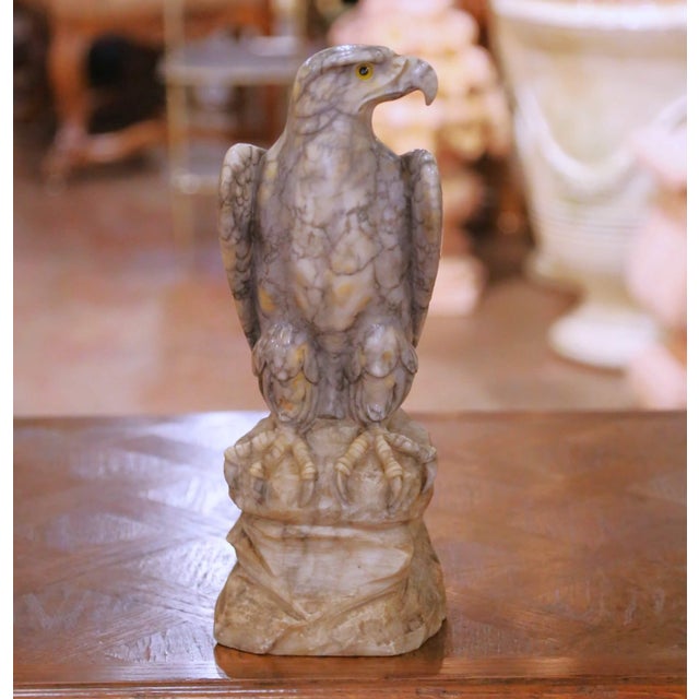 This striking antique eagle sculpture was carved in France circa 1880 and beautifully captures the commanding presence of...