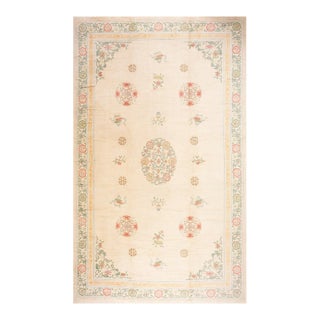 Ivory Background Color Delicate Details Floral in a Medallion Design Antique Chinese Peking Rug For Sale