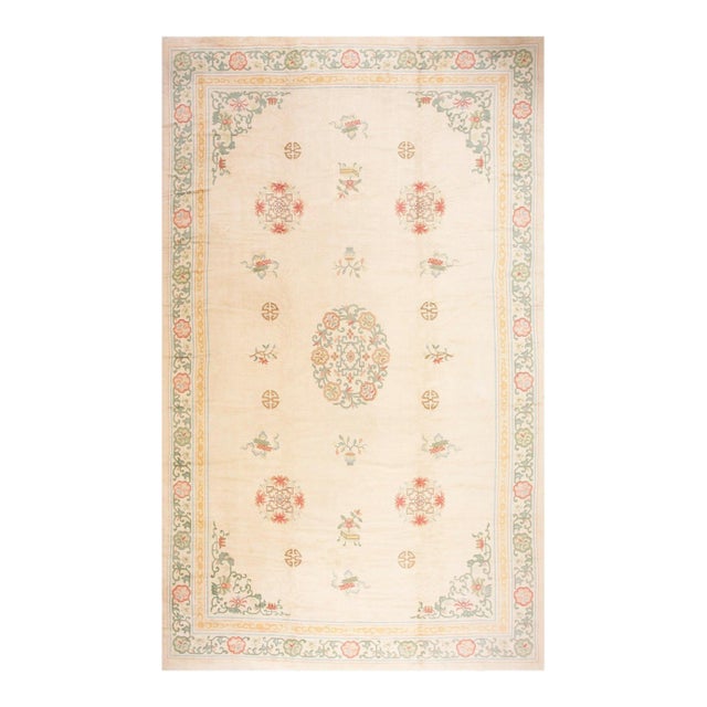 Ivory Background Color Delicate Details Floral in a Medallion Design Antique Chinese Peking Rug For Sale