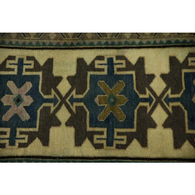 Introducing our exquisite vintage mini Turkish rug, expertly crafted by skilled artisans using traditional techniques that...