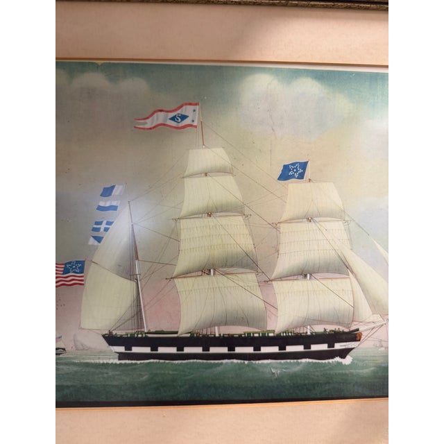 A finely presented maritime ship portrait depicting an American clipper under full sail, her signal flags and the Stars &...