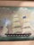 A finely presented maritime ship portrait depicting an American clipper under full sail, her signal flags and the Stars &...