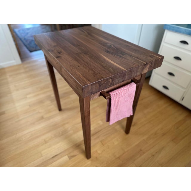 Enjoy your new heirloom quality butcher block table in solid black walnut hardwood. The black Walnut butcher block table...