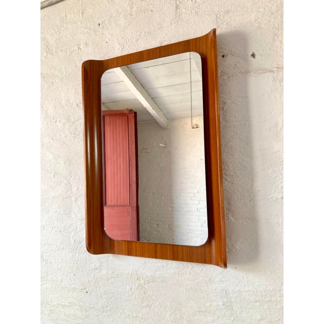 Mid-Century Modern Mirror in Curved Plywood, Italy, 1960s, in Flawless conditions. Designed 1960 to 1969