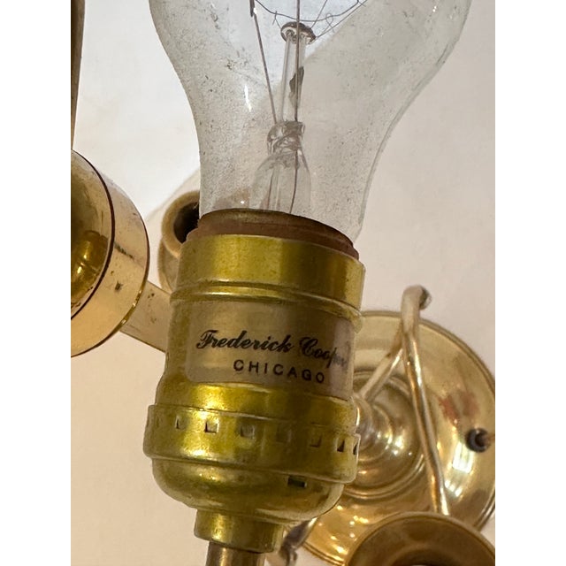 Lovely hand painted and brass bouillotte table lamp by Frederick Cooper Chicago having striking black and gold hand...