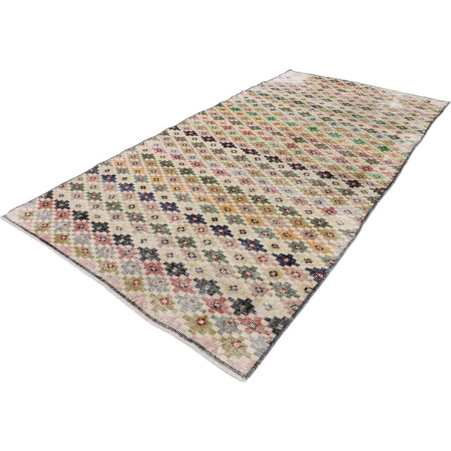 , distressed vintage Turkish Sivas rug with Rustic Mid-Century Modern style. This hand knotted wool distressed vintage...