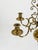 Elegant Swedish chandelier executed in solid polished brass by Skultuna Bruk, Sweden, mid-20th century. The chandelier...