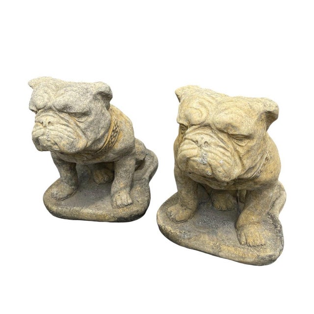 This pair of vintage cast stone English Bulldog statues captures the stoic and watchful nature of the breed with classic...
