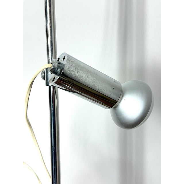 This is a stunning floor lamp produced by Reggiani Illuminazione between the late 1960s and early 1970s. It is an iconic...