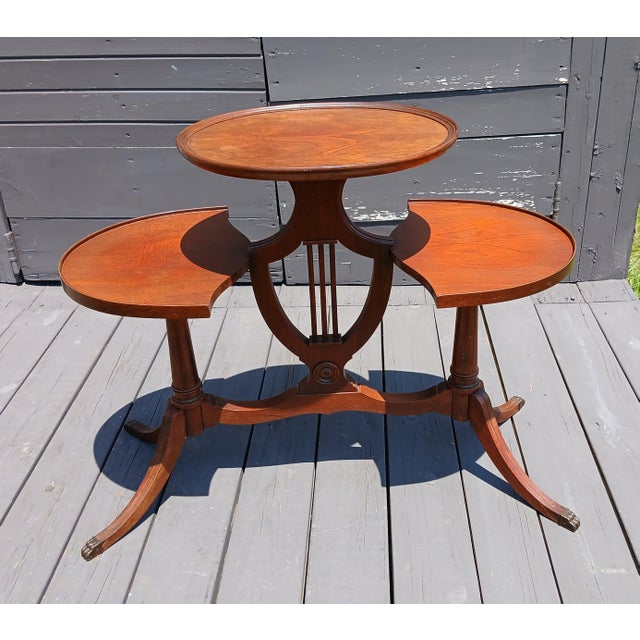 Antique Mahogany Mersman 3 Tier Stand or Tea Table with Claw Feet 1930s Era An antique mahogany three tier stand or tea...