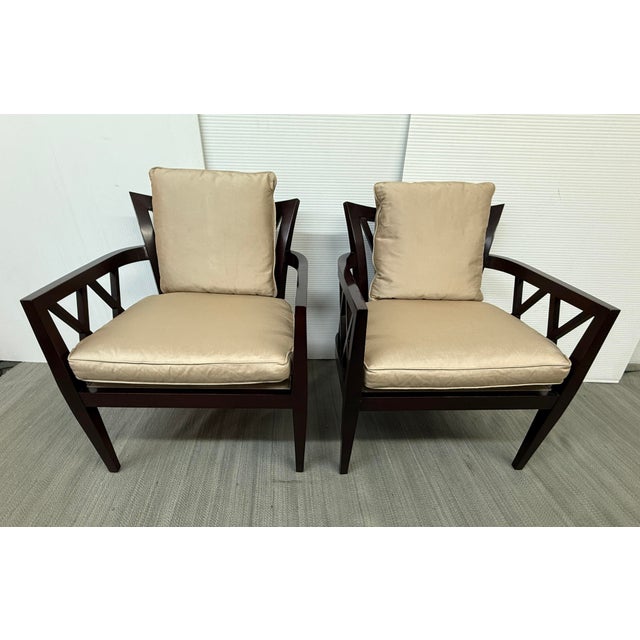 Design Plus Gallery presents a Pair of Double X Club Chairs by Barbara Barry for Baker Furniture. These chairs showcase...