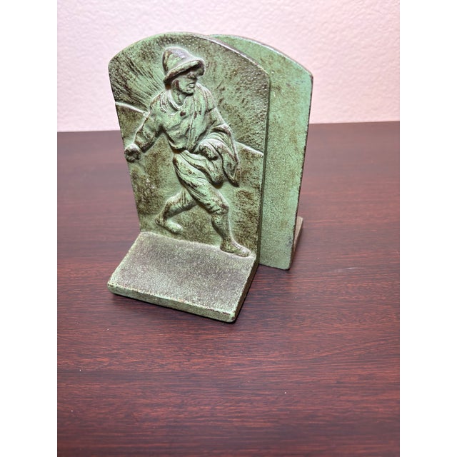 What a formidable WWII era soldier depicted in these metal bookends stamped with a serial number 71 on the inside. The...