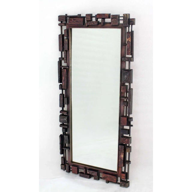 Very nice design mid-century modern cityscape style molded frame mirror.