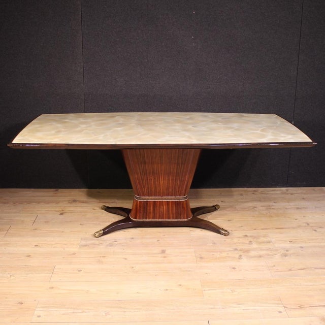Great Italian dining table from the mid-20th century. Beautifully designed and beautifully furnished, manufactured by...