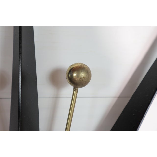 Stunning vintage black & gold starburst wall clock by Welby. This clock is in good working condition. A new mechanism has...