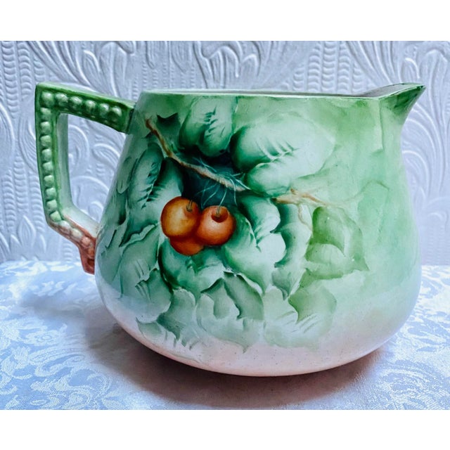 Such a beautiful hand painted cabinet pitcher to brighten any decor.