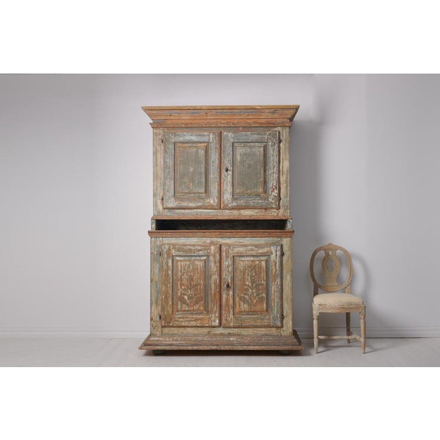 Antique Swedish baroque cabinet. The cabinet is a genuine Swedish country house furniture from the late 1700s. It is a...