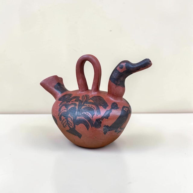 Mexican folk art ceramic ewer with goose form, with hand painted details 10.5” height 9” width 14” depth