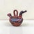 Mexican folk art ceramic ewer with goose form, with hand painted details 10.5” height 9” width 14” depth