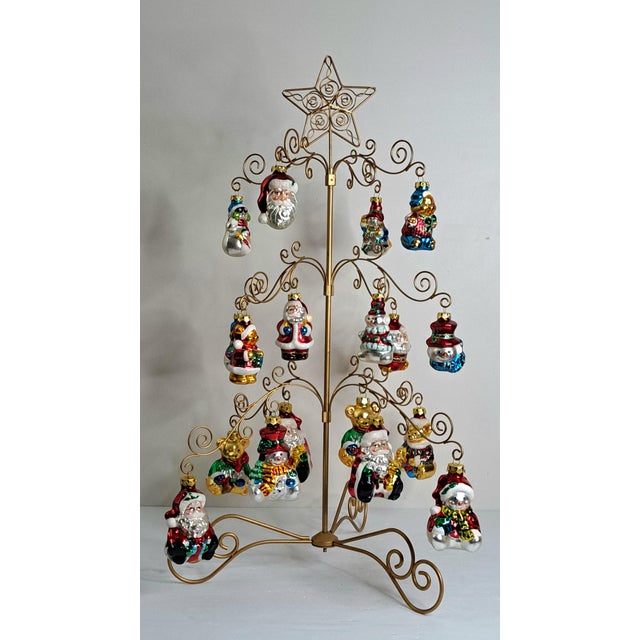 This is a Vintage Grandeur Noel Collector’s Edition 19‑Piece Glass Ornament Christmas Tree Set, complete and preowned but...