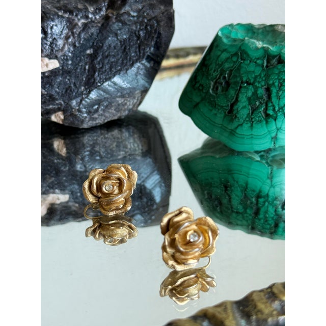 Vintage sculptural rose clip on earrings featuring a fully dimensional 3D bloom design with layered, textured petals. Each...