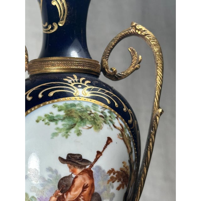 Antique Sevres Style Cobalt Blue Porcelain Vase, Double Handled Lidded Urn This 19th Century lidded urn in cobalt blue is...