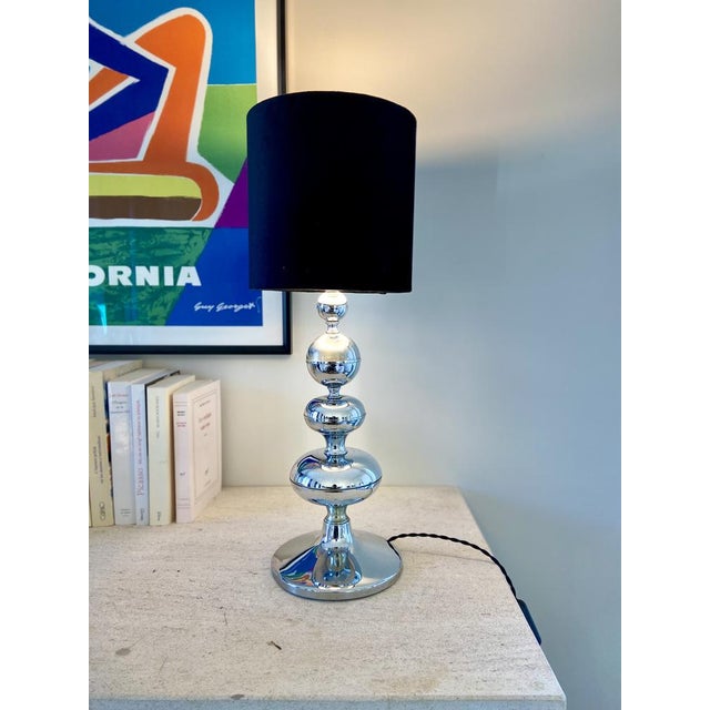 Chromed metal lamp base. In very good condition. 1970s. The foot has stood the test of time and has a few marks....