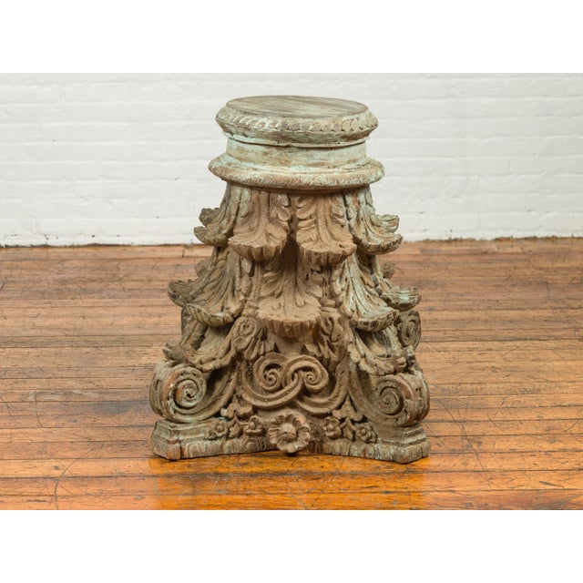 An antique Indian Corinthian temple capital from the 19th century, with distressed patina. Created to adorn the exterior...