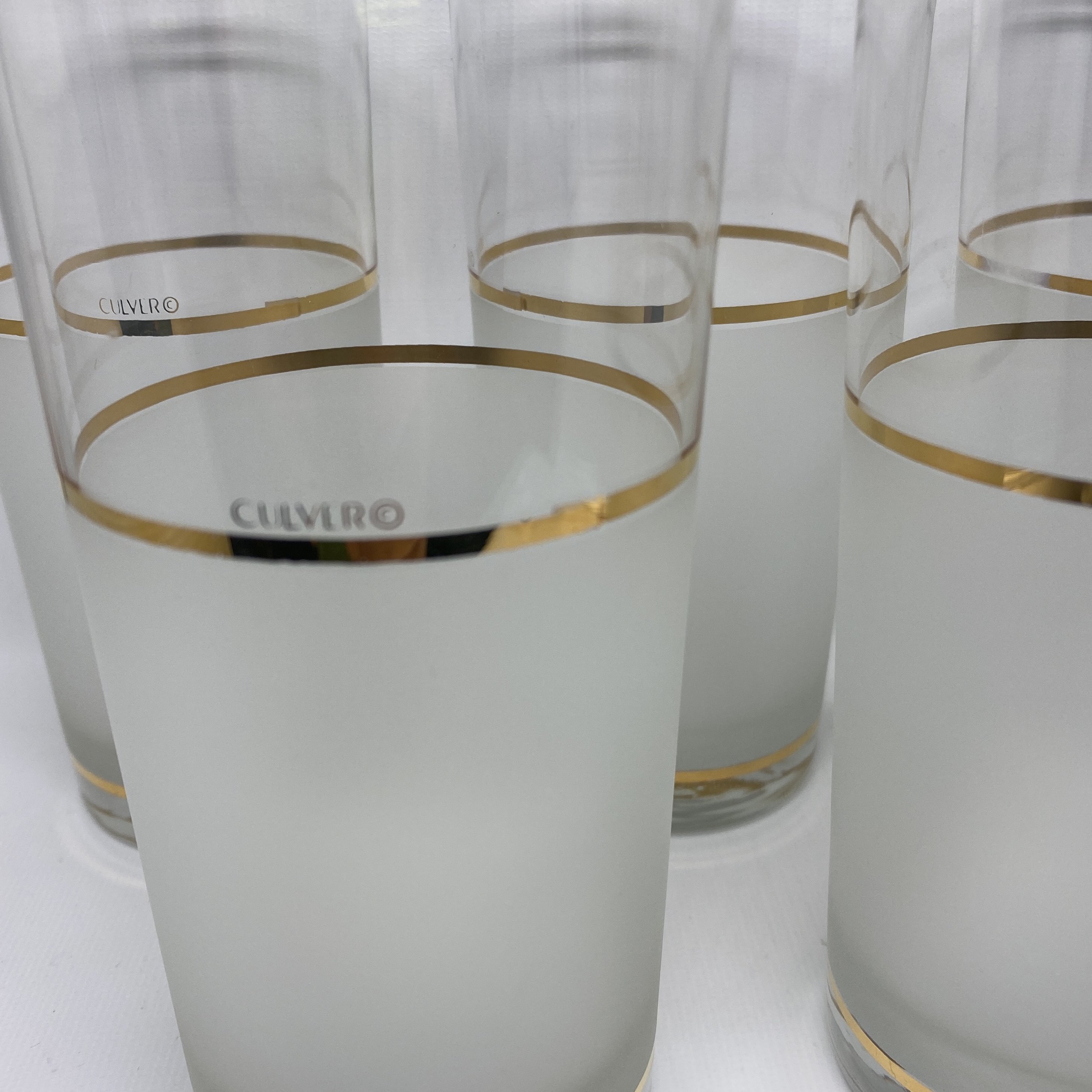 clear glasses with gold trim