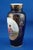 Item : A vitrified hard-paste porcelain vase with a central decoration depicting a pair of children, entirely hand-...