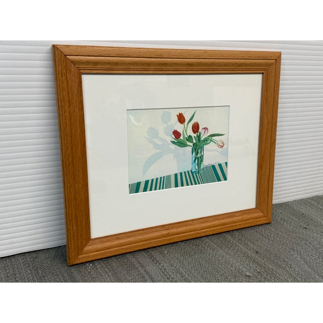 Design Plus Gallery presents Red Tulips in a Crystal Vase by Sally Baker. The heavy bulbed are in different stages of...
