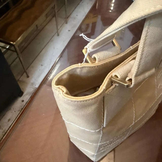 Beige A Vintage 2000s Chanel Beige Canvas Tote Bag in Excellent Condition For Sale - Image 8 of 17