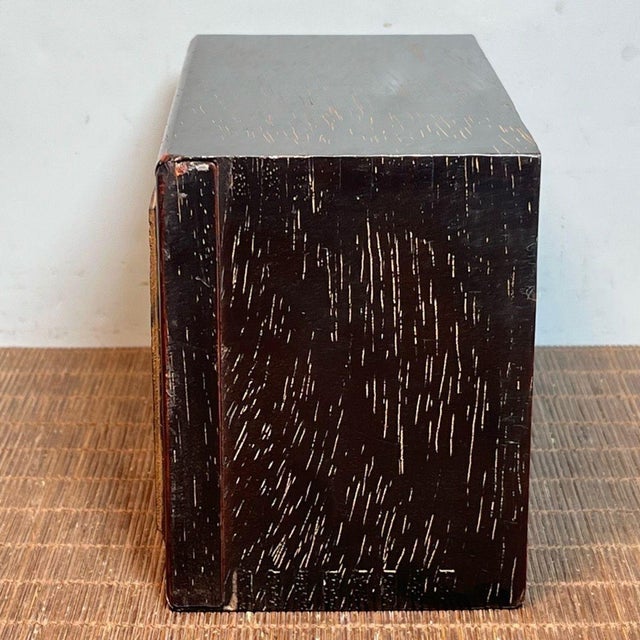 A beautifully carved vintage Chinese hardwood jewelry box, crafted from rich, dark Blood Sandalwood. The front panel...
