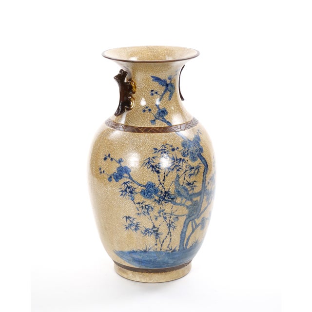 A beautifully crafted mid-20th-century Chinese porcelain vase, finely decorated in underglaze cobalt blue with elegant...