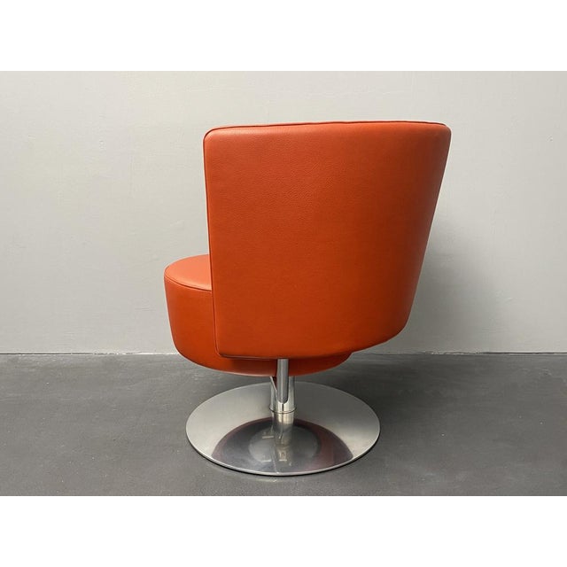 Circo Swivel Armchair in Red Leather by Peter Maly for Cor, 1990s, in Very Good conditions. Designed 1990 to 1999 This...