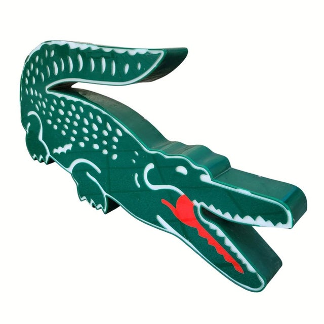 Impressive illuminated sign from the 1980s, featuring the iconic crocodile of the prestigious French brand Lacoste. It was...