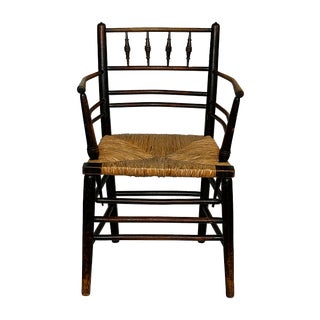 Antique Sussex Armchair • William Morris • Arts and Crafts Ebonised With Rush Seat For Sale