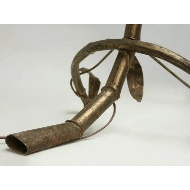 Vintage mid-century Italian, gilded metal bamboo-form, 3-light floor lamp with original matching metal shades. The gilding...