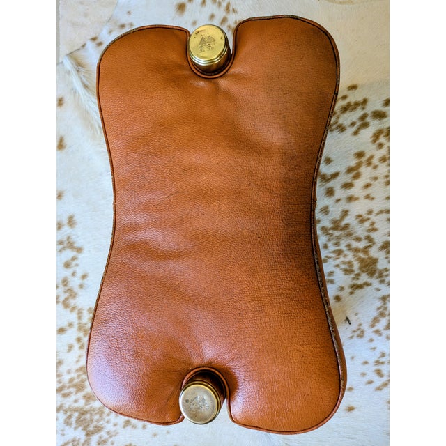 Add a perfect touch of mid-century bohemian charm to your space with this authentic vintage Egyptian camel saddle stool....
