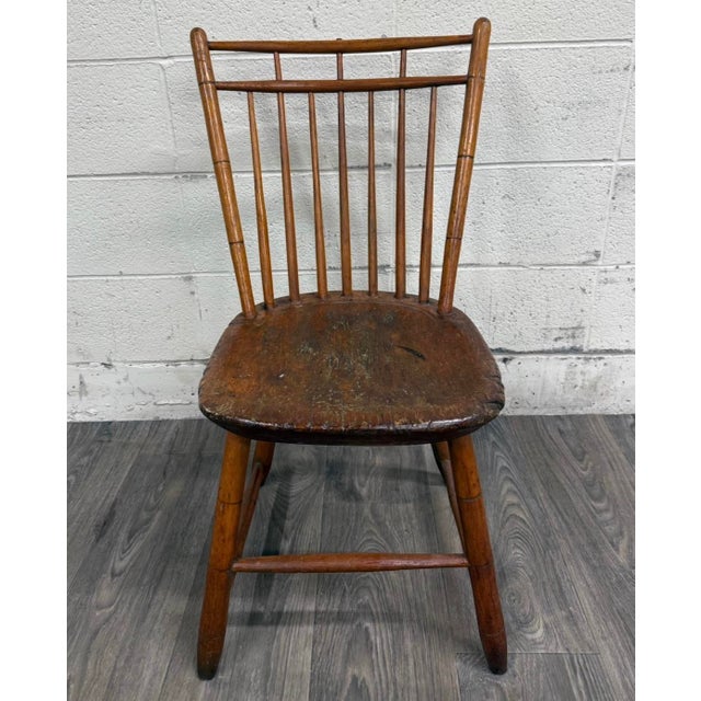This is a gorgeous antique American Windsor farmhouse style plank seat dining chair, likely from the early 19th century...