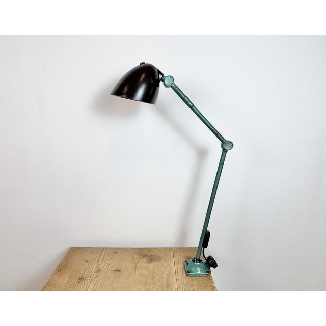 Large industrial table lamp with three adjustable joints made by Elektrosvit in former Czechoslovalia during the 1960s.It...